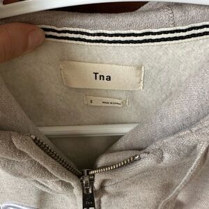TNA sweater in cream/graysih colour